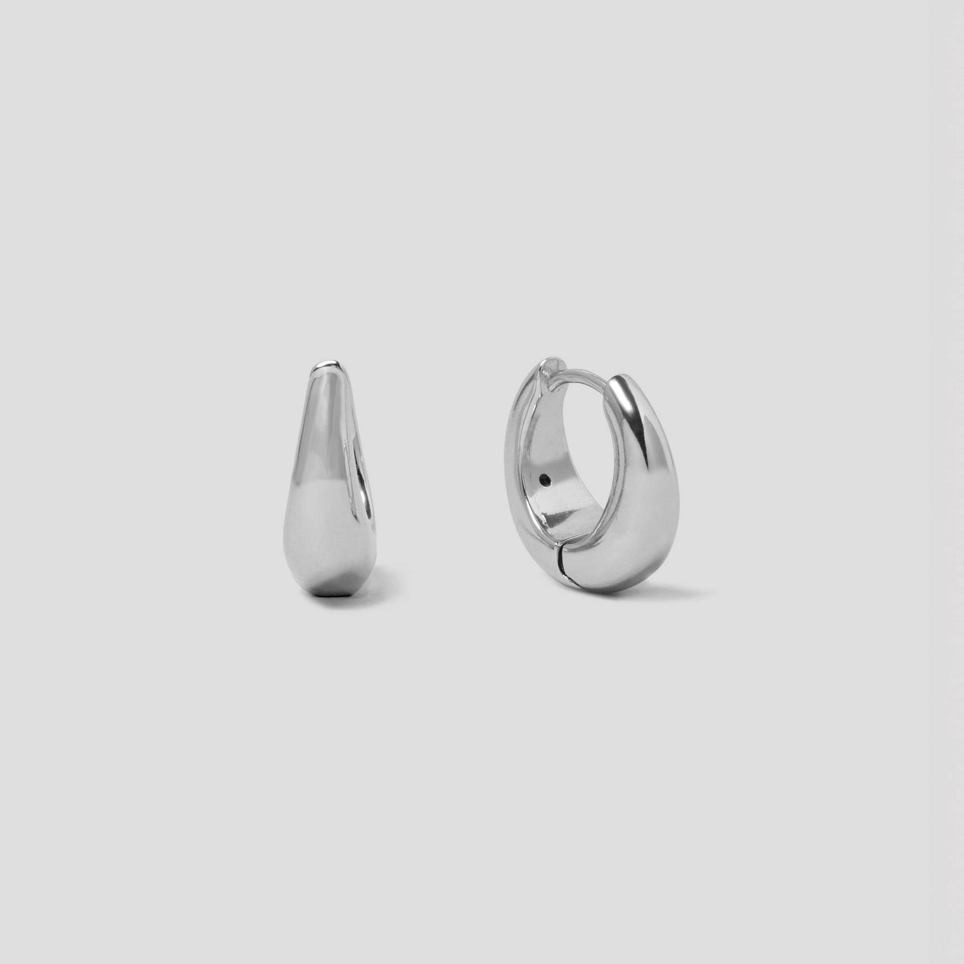 Teardrop Domed Silver Huggie Hoop Earrings in Rhodium Plated Sterling Silver