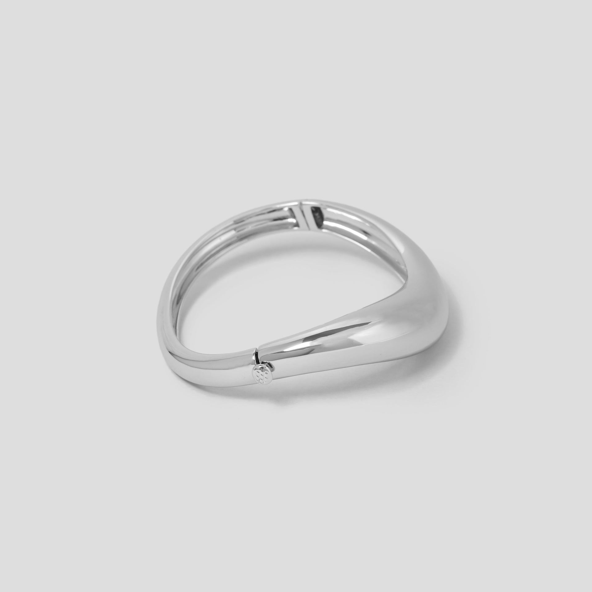 Rhodium Plated Wave Domed Bangle Bracelet